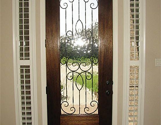 FRONT ENTRY - GLASS AND IRON DOOR