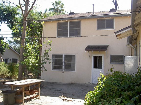 photograph of back of home-2 story portion