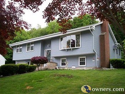 NEW SIDING AND 3 SEASON ROOM IN BACK