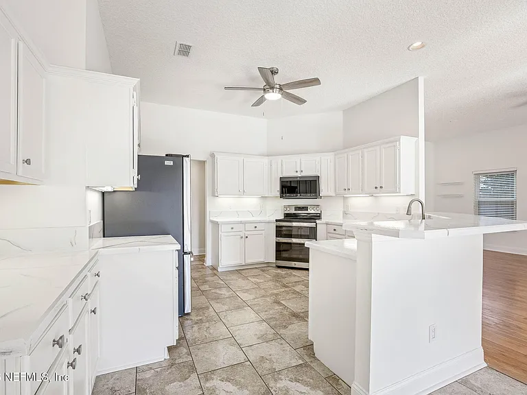 3447 Heron Dr N — Photo 14