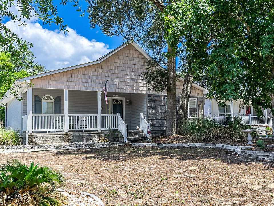 1st image of 302 E Oak Island Drive