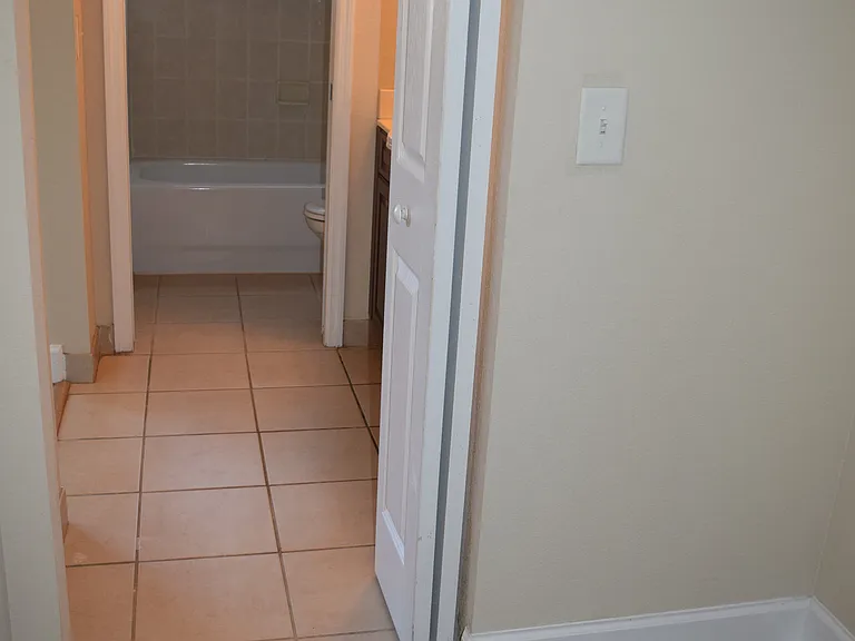 Master bath with walk-in closet.