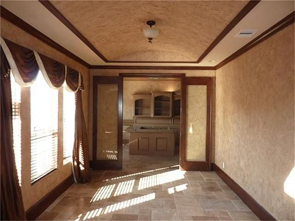 Formal living to left of entry leads through to study