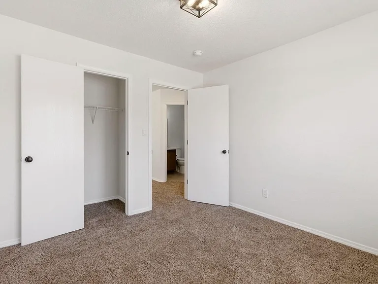 Third bedroom is off of living room and near the second bathroom.