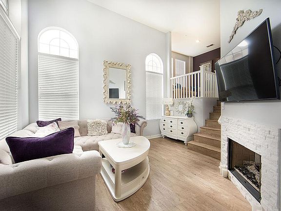 Living Room w a 55" LG Tv and Cozy Fireplace!