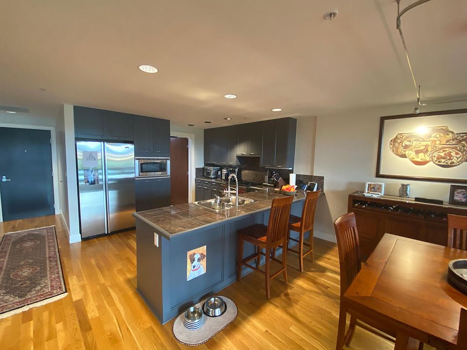 View of large kitchen, plenty of storage space!