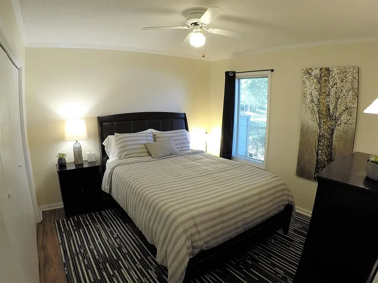 2nd bedroom with high quality, pressure-relieving, and supportive queen size memory foam mattress. Lots of storage space in an almost wall-to-wall closet.