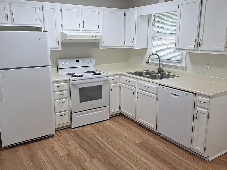 Well appointed kitchen, new range, disposal, faucet and dishwasher.