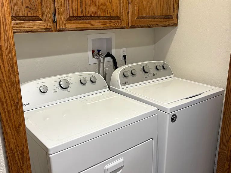 Private washer and dryer plus storage above