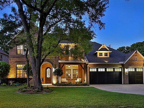 The curb appeal is lovely by day or by night....
