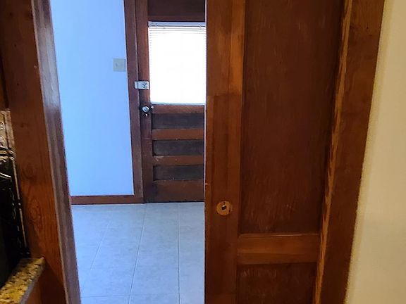 pocket door between kitchen and laundry room