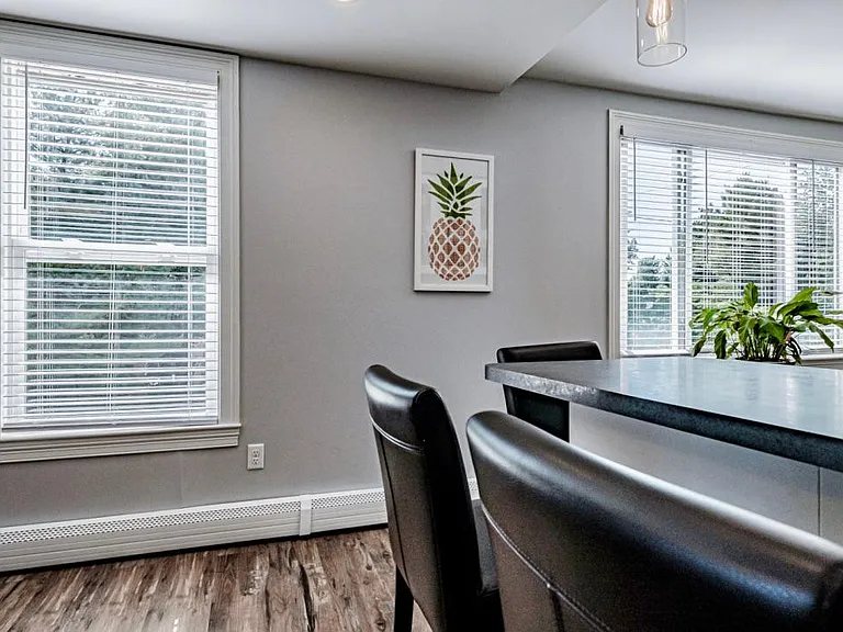 Large windows in the kitchen and dining area