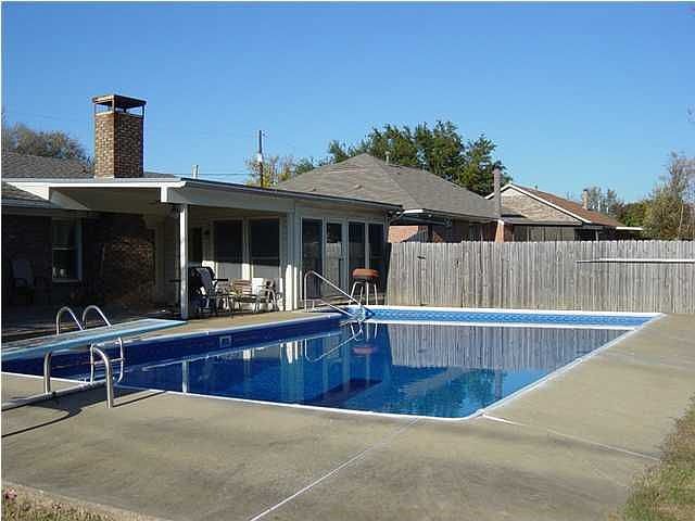 Large back yard with privacy fence.