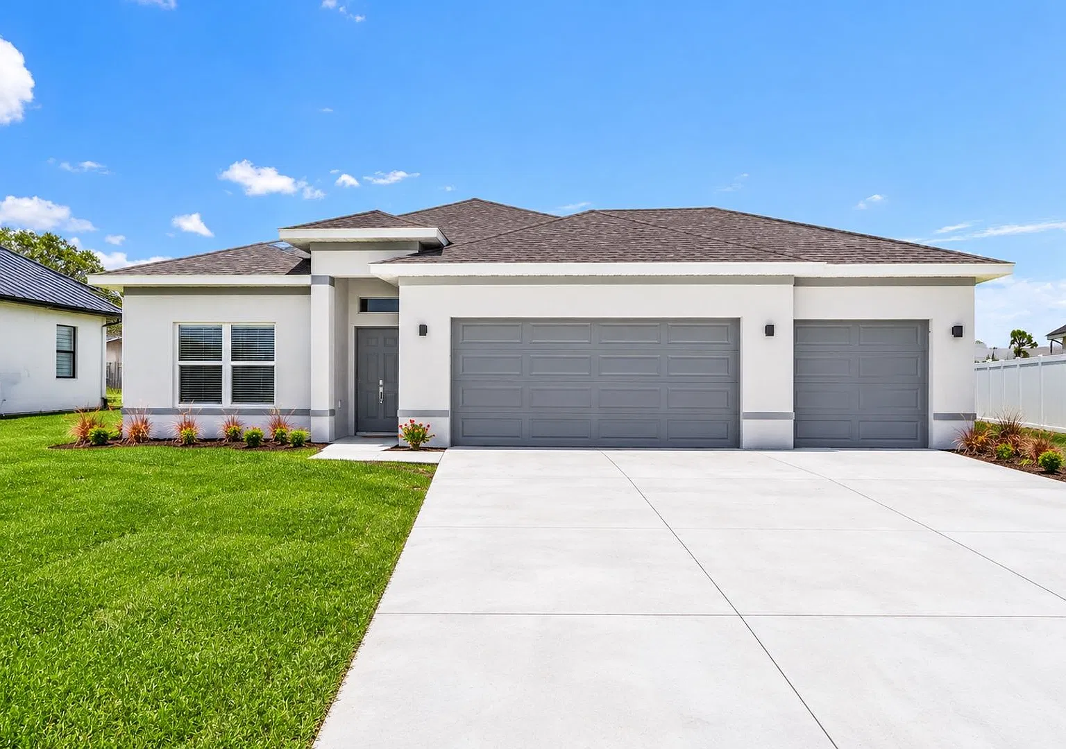 Brand-New 4-Bedroom Canal-Front Home In Cape Coral 3-Car Garage & Luxury Upgrades! — Photo 1