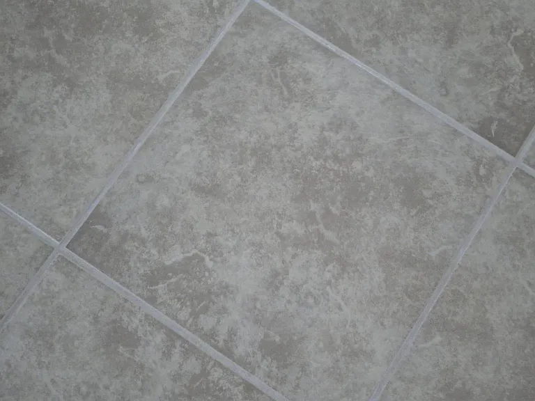 The tiles entire area downstairs, 
2.5 Bathrooms , and the Laundry all tiled