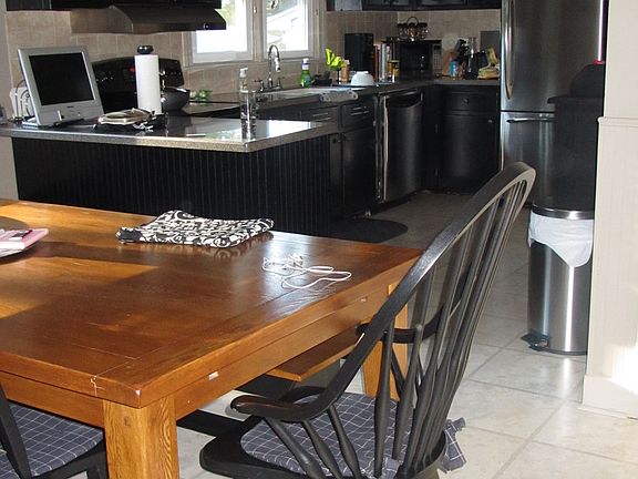 Gorgeous kitchen with new floor and SS appliances