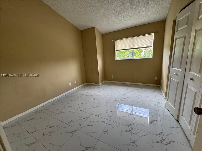 3441 NW 44th St #204 — Photo 13