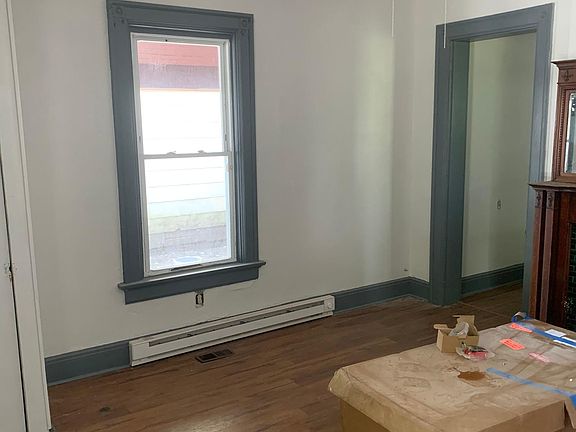 Living area and entrance to kitchen