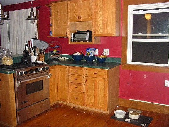 Kitchen showing Jenn-Air Stainless gas range.