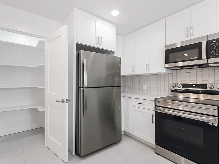 Stainless steel appliances. No gas, all electric.