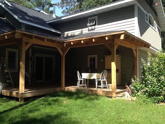 exposed timber covered porch