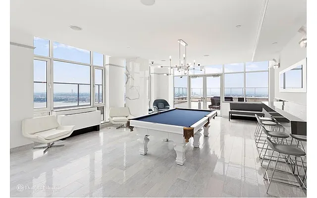 Sold by Douglas Elliman | media 11