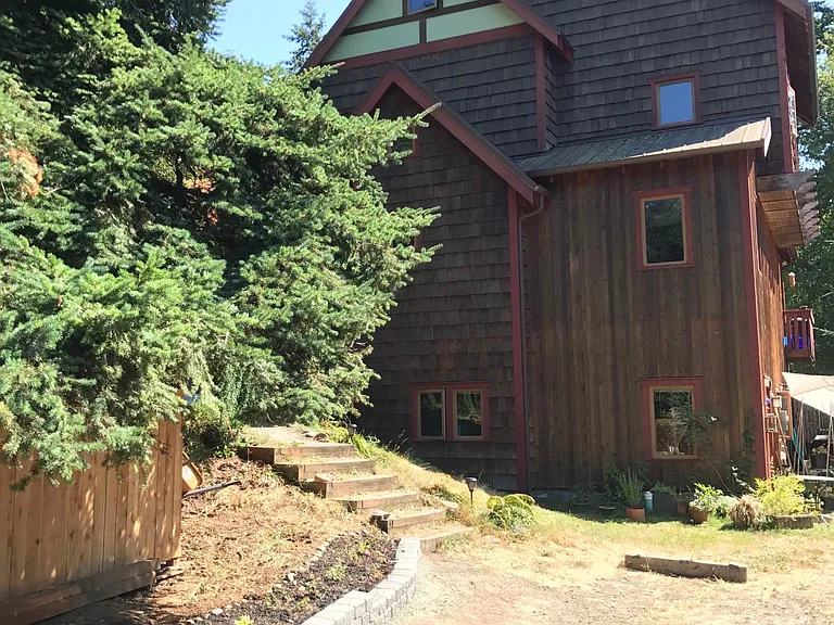 Front view, notice floor level seprate unit that is rented