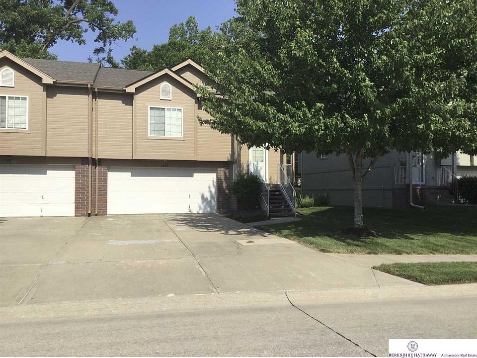 Move into maintenance free living today!  Rare find backing to trees.  No more mowing. Snow removal included. Easy living.