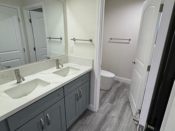 Master bathroom dual sinks and separate vanity from toilet