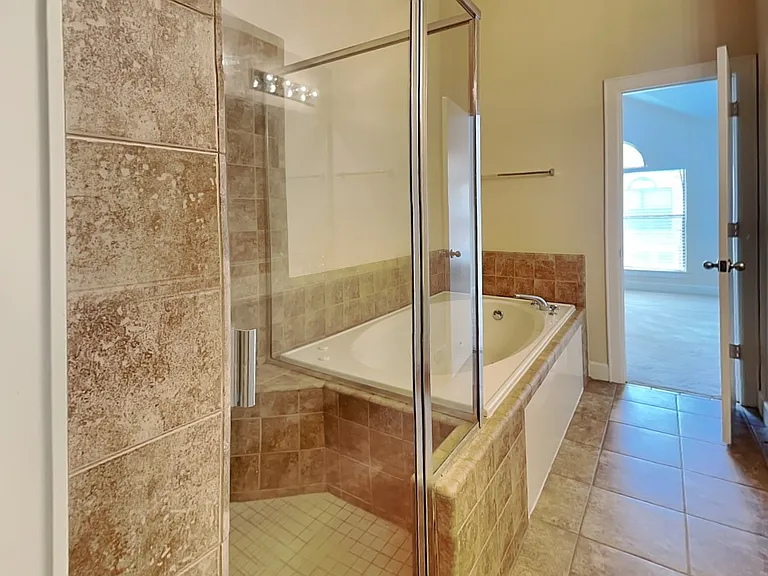 Modern bathroom with beige til