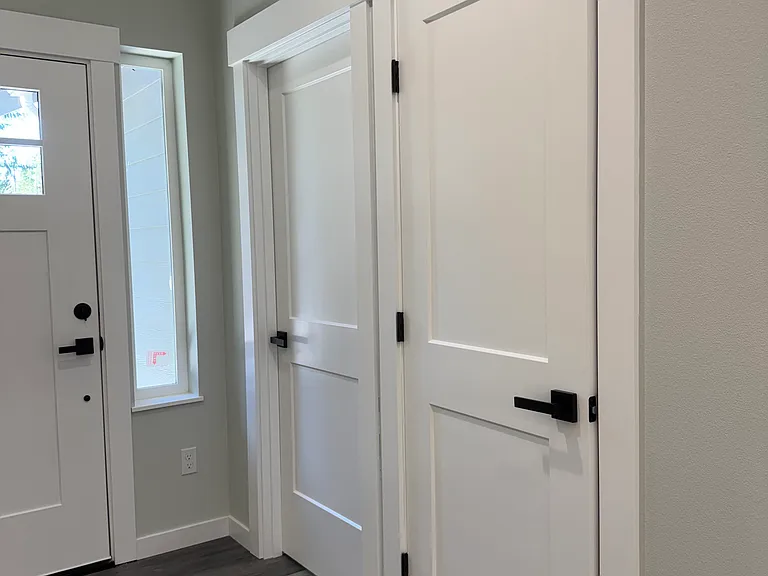Front door, First bedroom and entry way closet