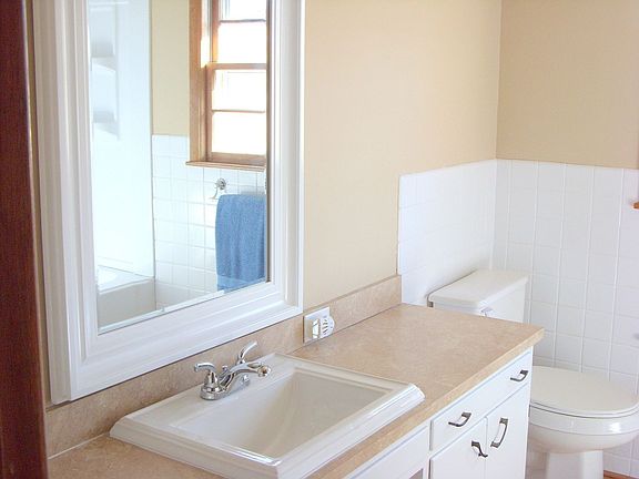 Well finished bathroom. New fixtures & mirror for a updated look.