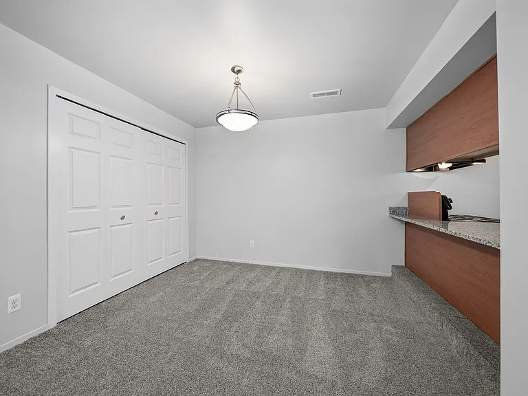 Cozy dining room space at Woodland Villa Apartments in Westland, MI.