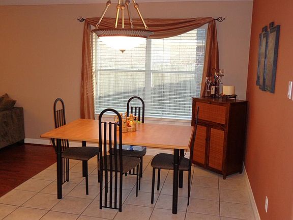 Breakfast area with tile floor