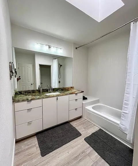 Sunny Ensuite Bath for Guest Room #1 
Tub/Shower plus water closet. Skylight Can also open to hallway