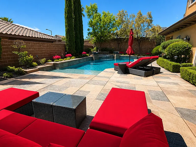 Oversized upgraded pool with ample seating area