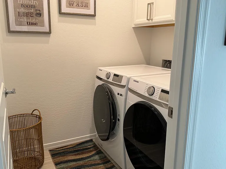 Laundry room with cabinets