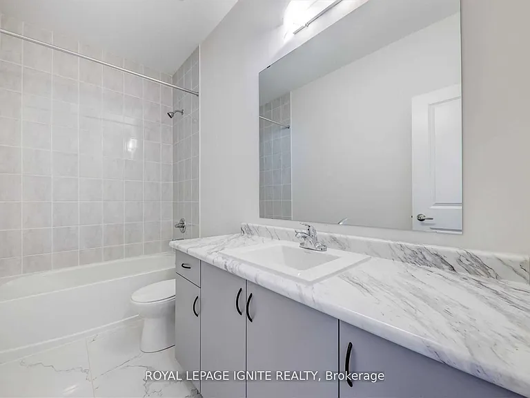 56 Rustle Woods Ave — Photo 33