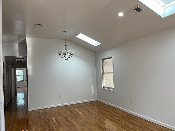Dining Room/Living Room Area with Skylights