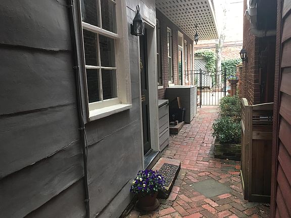 Alley and Front door to apartment