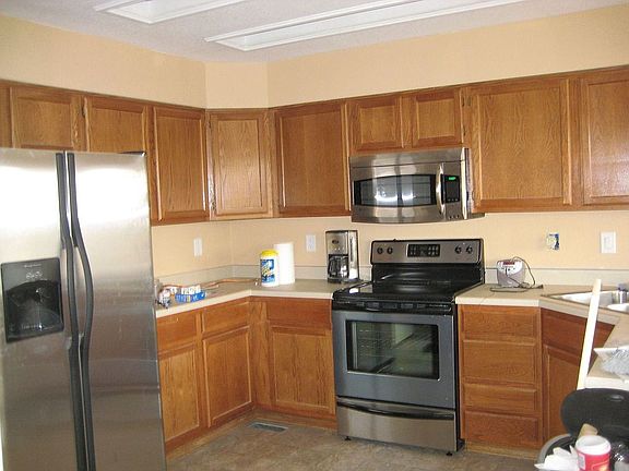 Kitchen  new appliances, sink, disposal, floor, trim, paint, GE Profile Micro