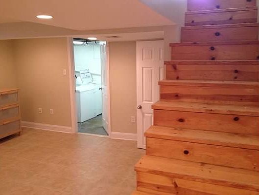 finished basement with laundry unit