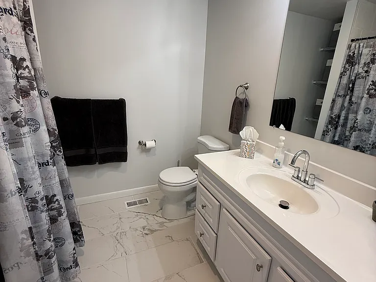 ensuite bathroom in primary bedroom