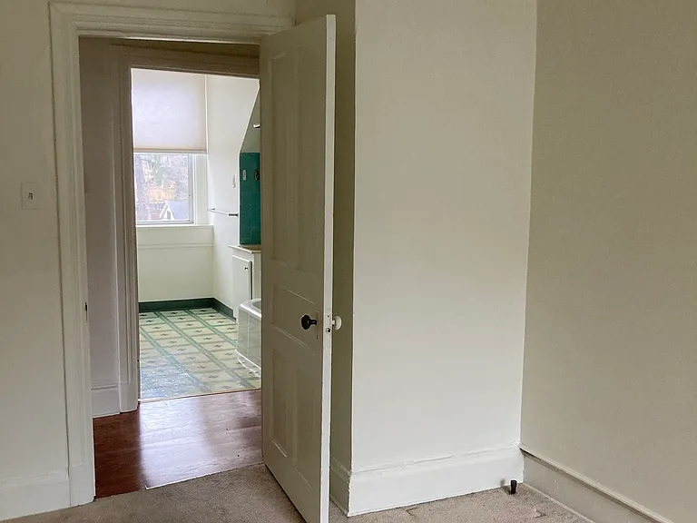 Additional carpeted room for an office area, workout room, craft room, etc.