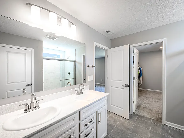 Primary bathroom and large walk-in closet