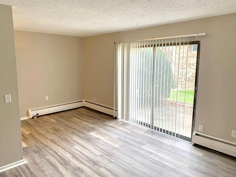 Dining room area, with sliding glass door to exterior patio for great outdoor living.