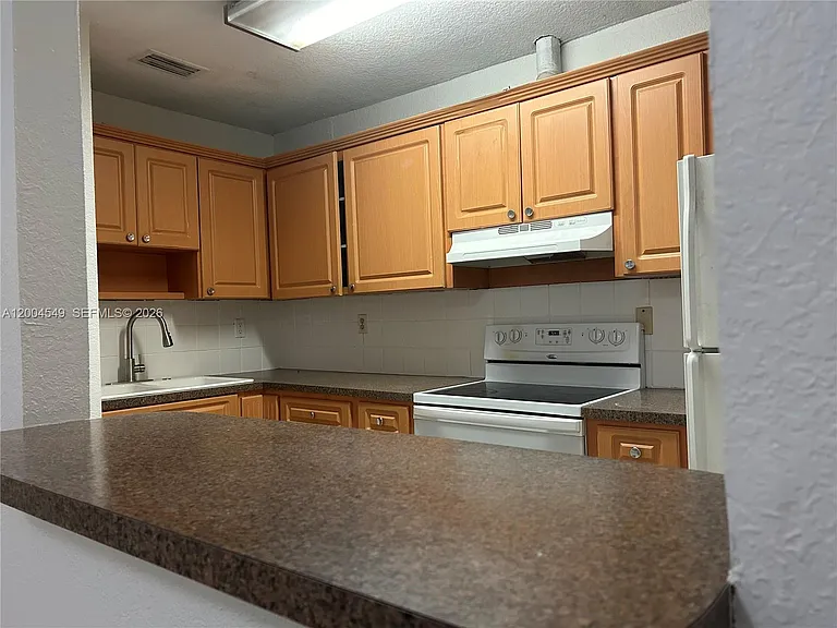 12960 SW 66th Ln #14 — Photo 10