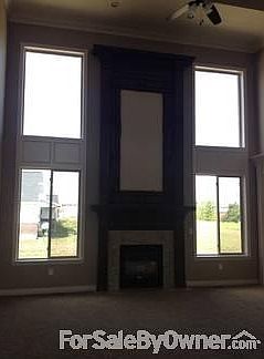 Living Room
						:
						Custom double mantle with double windows and decorative trim in between