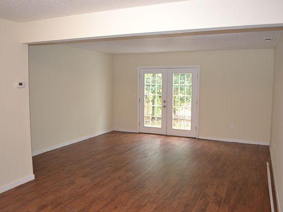 BEAUTIFUL NEW WOOD FLOORING!! Another view of dining rm and
