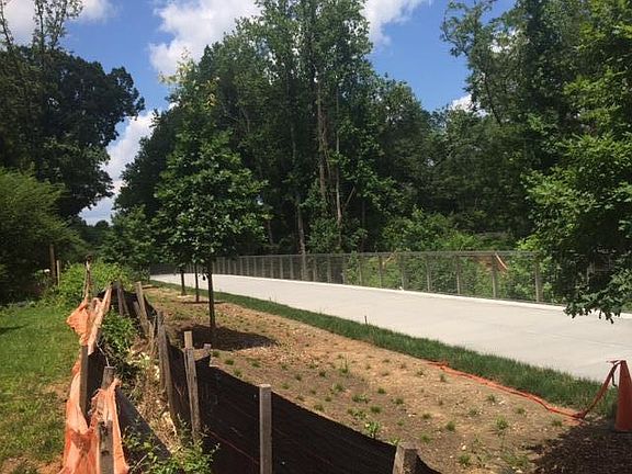 This is the Beltline, the multi-use trail that connects Atlanta neighborhoods and entertainment districts popular with cyclists, skaters and walkers. It is located behind the duplex with easy access to both it and Washington Park, which borders the neigh